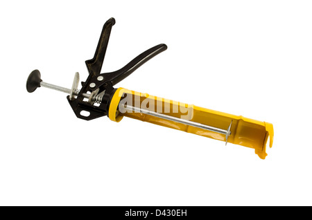 yellow silicone glue gun tool for waterproof works isolated on white background Stock Photo