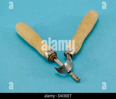 pair of chisel graver carve tools for wood work on blue background. Stock Photo