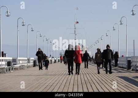 Sopot, Poland 3rd, March Sopot citizens and turists enjoy sunny weather. People walks and on Sopot's pier and Baltic coast Stock Photo