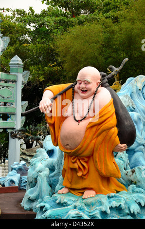 Buddhist monk statue at Haw Par Villa theme park Singapore Stock Photo ...
