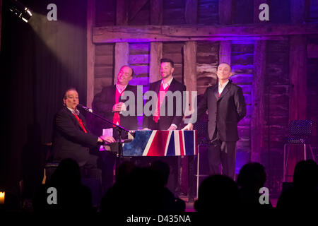 Essex, UK, Friday 2nd March 2013. The New 4 Poofs and a Piano perform live at The High Barn, Great Bardfield, Essex, UK, during their 2013 Tour. Left, Bobby Crush, 2nd left, Ian Lilley, 3rd left Graeme Clark, right, Big Dave Wickenden Stock Photo