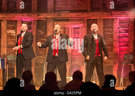 Essex, UK, Friday 2nd March 2013. The New 4 Poofs and a Piano perform live at The High Barn, Great Bardfield, Essex, UK, during their 2013 Tour. Left, Ian Lilley, centre, Big Dave Wickenden, right, Graeme Clark Stock Photo