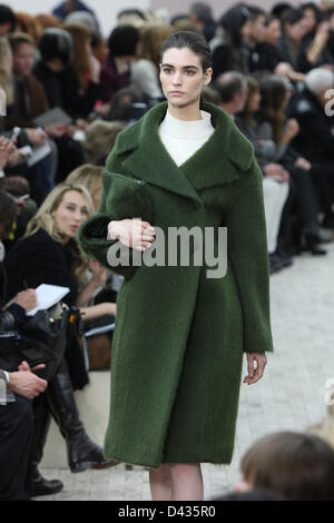 A model wears a creation as part of the Celine ready to wear Fall ...