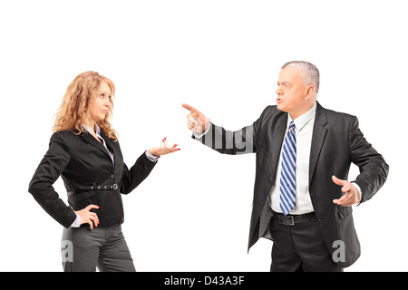 Mature man in a suit having a disagreement with a businesswoman isolated on white background Stock Photo