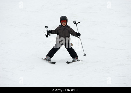Child Young Boy skiing, winter season, snow Stock Photo