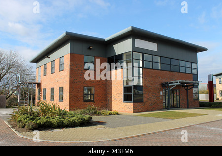 Modern office building available for rent in business park. Stock Photo