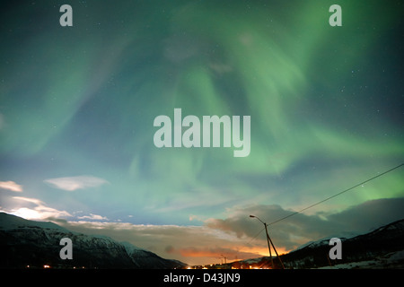 view of swirling northern lights aurora borealis near tromso in northern norway europe