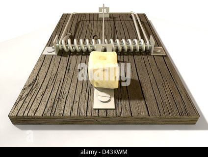 A regular wood and metal mousetrap baited with a block of cheese on an isolated background Stock Photo