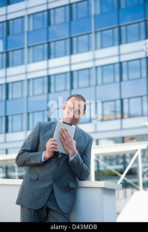 Businessman using Tablet PC, Niederrad, Frankfurt, Germany Stock Photo