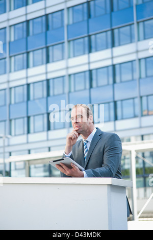 Businessman using Tablet PC, Niederrad, Frankfurt, Germany Stock Photo