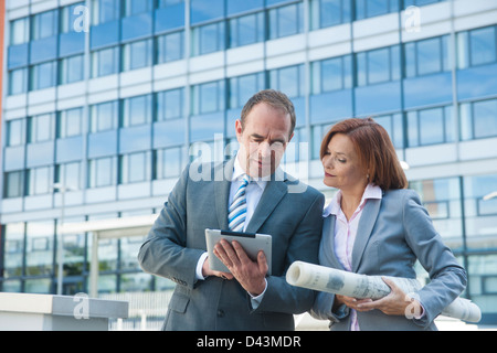Business People using Tablet PC, Niederrad, Frankfurt, Germany Stock Photo