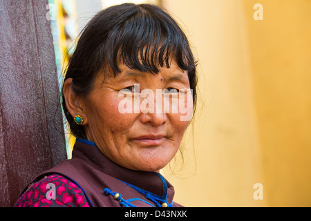 Buddhist woman at Boudhanath Stupa, Kathmandu, Nepal Stock Photo