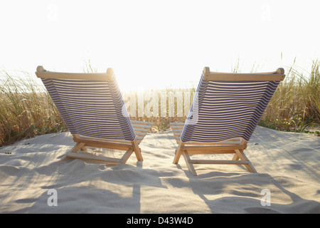 Beach Chairs and Dune Grass on the Beach, Cap Ferret, Gironde, Aquitaine, France Stock Photo