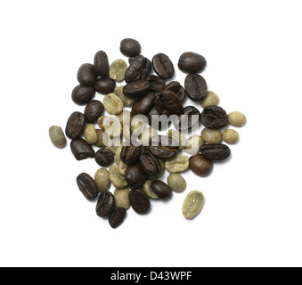 Selection of green and brown coffee beans cut out white background Stock Photo