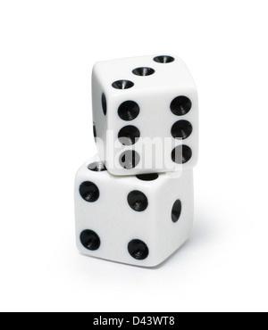 Two dice stacked on top of each over cut out white background Stock Photo
