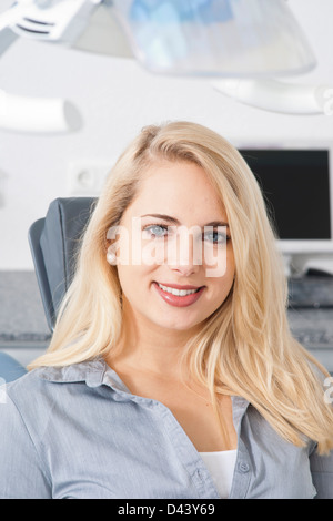 Close-up of Young Woman at Dentist's Office for Appointment, Germany Stock Photo