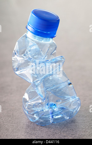 Close-up of Crushed, Empty Water Bottle Stock Photo