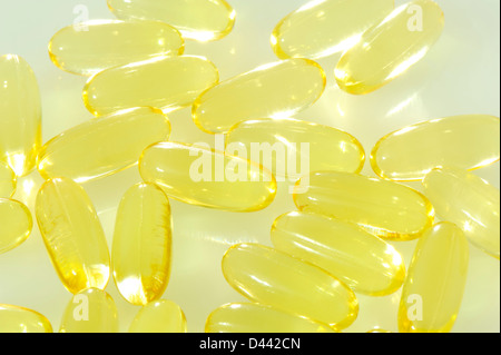 Fish oil capsules closeup on white background Stock Photo