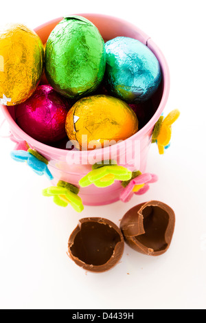 Chocolated Easter eggs wrapped in colorful foils. Stock Photo