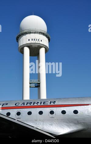 Radar tower and Rosinenbomber (Candy Bomber) are pictured at Berlin Tempelhof Airport, which was shut down on 30 October 2008, in Berlin, Germany, 30 September 2011. Fotoarchiv für ZeitgeschichteS.Steinach Stock Photo