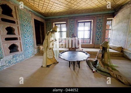 Exhibit in the Topkapi Palace Harem representing the Queen Mother and her attendants in her apartments, Istanbul, Turkey. Stock Photo