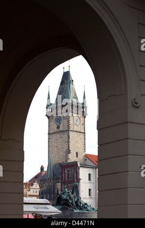 View through arch of Jan Hus Memorial and Old Town Hall, Old Town Square, Prague Stock Photo