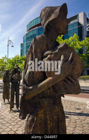 Vertical close up of one of the statues at the Famine Memorial in Dublin on a sunny day. Stock Photo