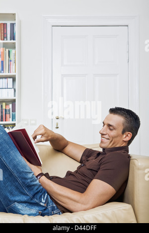 a man enjoying a book Stock Photo