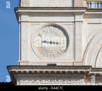 Detail of clock face on Trinita dei Monti church at top of Spanish Steps in Rome Italy Stock Photo