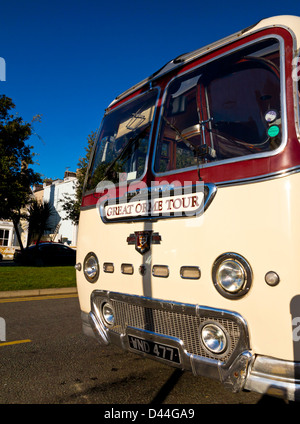 Alpine Travel vintage coach used to transport passengers around Marine Drive on the Great Orme in Llandudno North Wales UK Stock Photo