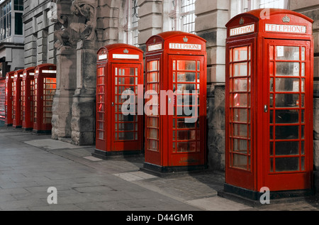 8 K6 Telephone Boxes designed in 1935 by Sir Giles Gilbert Scott,  outside the General Post Office at Blackpool, Lancashire, UK Stock Photo