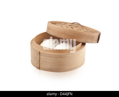 Dumpling dim sum steamed basket isolates on white Stock Photo