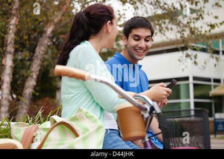 Smiling students talking on campus Stock Photo
