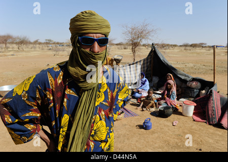 BURKINA FASO Djibo, malian refugees, mostly Touareg, in refugee camp Mentao of UNHCR, they fled due to war and islamist terror, Touareg wearing a Tagelmust, turban and veil combination Stock Photo