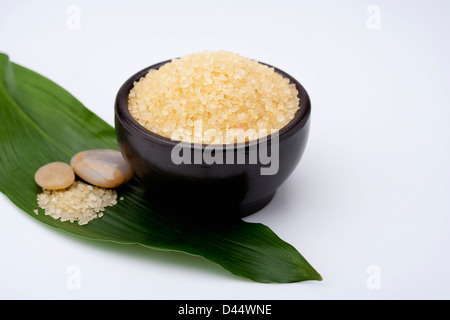 bathing crystals in a bowl on a leaf Stock Photo