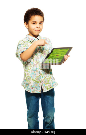 Black boy shows photograph on tablet computer pointing with finger (image from photographers portfolio) Stock Photo