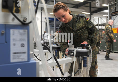 Leer, Germany. 5th March 2013. Nurse, Staff Sargeant Antje S. from the rapid deployment medical services troups prepares an anaesthesia machine for shipment to Mali in Leer, Germany, 05 March 2013. The preparations are part of the up-coming German Army operations in Mali/Africa. Photo: INGO WAGNER/dpa/Alamy Live News Stock Photo