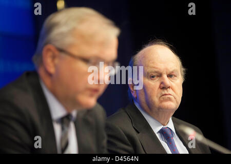 Brussels, Belgium. 5th March 2013. Economic and Monetary Affairs Oli Rehn (L) and Irish finance minister Michael Noonan (R) pictured during a press conference after the Ecofin meeting. Credit:  Bernal Revert/Alamy Live News Stock Photo