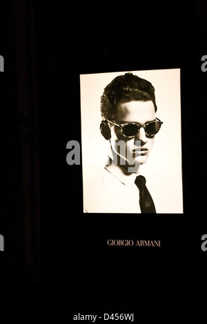 Giorgio Armani mens fashion illuminated advert Milan Lombardy Italy Europe Stock Photo