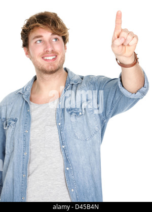 Young handsome happy casual Caucasian man pressing / pushing button isolated on white background Stock Photo
