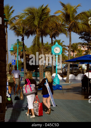 Times Square in Fort Myers Beach, Florida, USA, draws families to soak up the sun and play in the sea, Stock Photo