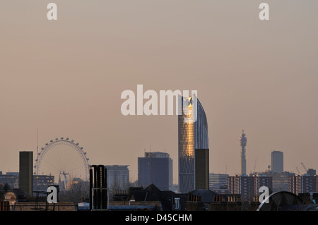 London UK skyline at dusk, viewed from Peckham, South East London, with Millennium wheel and PO tower Stock Photo