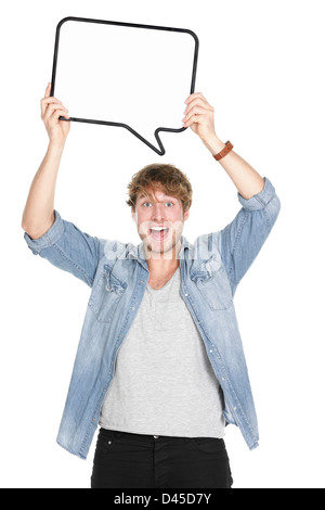 Young casual Caucasian man in his twenties holding sign speech bubble screaming isolated on white background Stock Photo