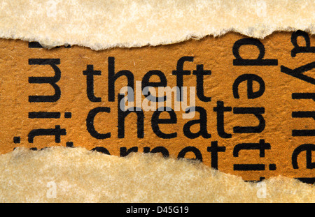 Theft cheat text on paper hole Stock Photo