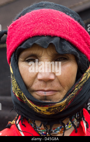 Berber woman with facial tattoo on her lip, near Todra Gorge, Morocco Stock Photo