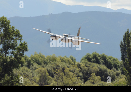 de Havilland Mosquito KA114 flying low down reminiscent of the war time raids by the RAF fighter bomber planes such as film 633 Squadron Stock Photo