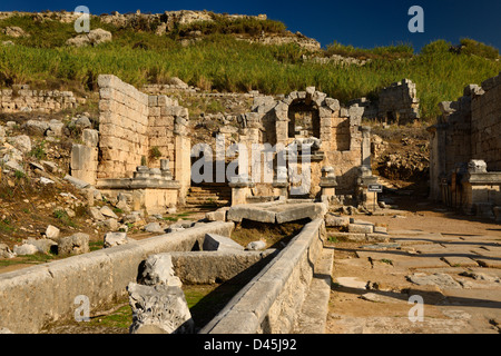 North Nymphaeum monument with fountain statue of River god Kestros at the foot of the Acropolis at Perge Turkey Stock Photo