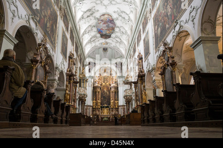 Interior Central Aisle at St Peter's Church. The overwhelming complexity of the decoration causes tourists to stop and stare Stock Photo