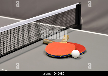 Equipment for table tennis - racket, ball, table closeup. Stock Photo