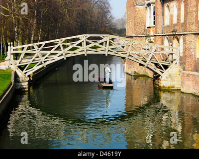 Punt under Mathematical Bridge over River Cam in Cambridge  Stock Photo